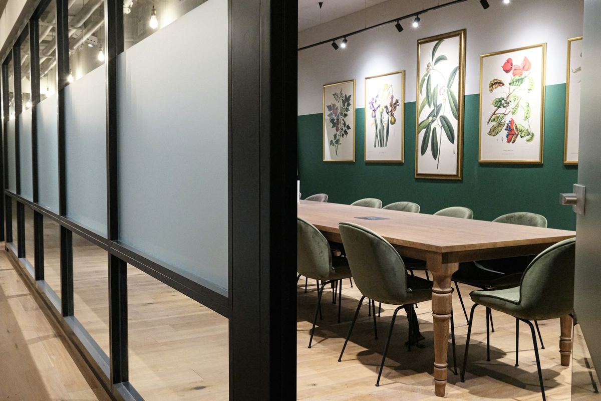 Frosted glass partition beside a meeting room