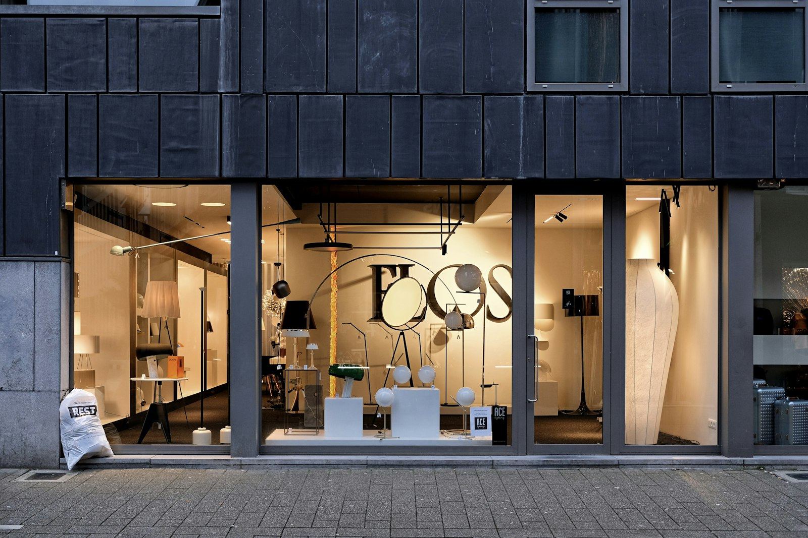 Modern boutique storefront with full-height glass